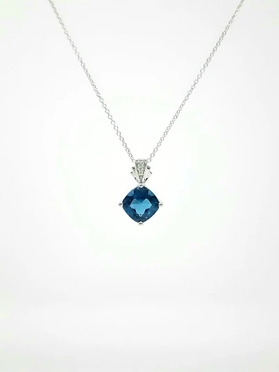 Blue Topaz and Diamond Pendant