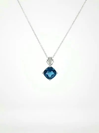 Blue Topaz and Diamond Pendant