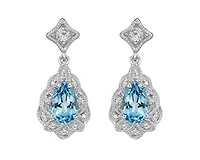 10K White Gold 6x4mm Pear Cut Swiss Blue Topaz and 0.05cttw Diamond Dangle Earrings