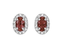 10K White Gold 5x3mm Oval Cut Garnet and 0.11cttw Diamond Halo Stud Earrings with Butterfly Backings