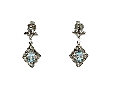 10K White Gold 0.60cttw Genuine Sky Blue Topaz & 0.03cttw Diamond Earrings