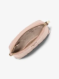 Grand sac à bandoulière arrondi en cuir matelassé