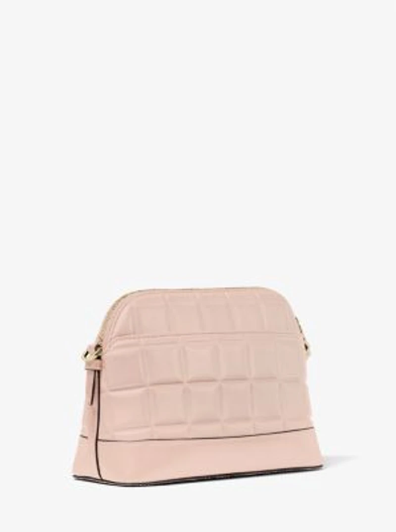 Grand sac à bandoulière arrondi en cuir matelassé