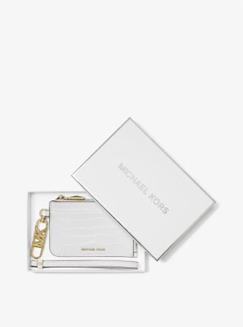 Petit porte-cartes en cuir gaufré à motif crocodile et à fermeture éclair