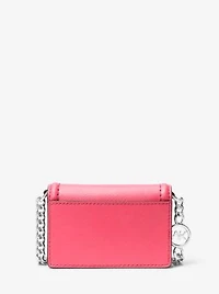 Sac enveloppe à bandoulière Jet Set miniature en cuir Saffiano