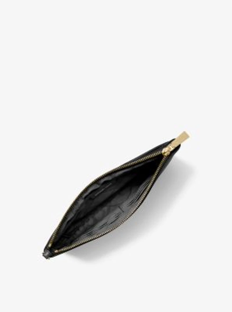Grande pochette-bracelet en cuir grainé