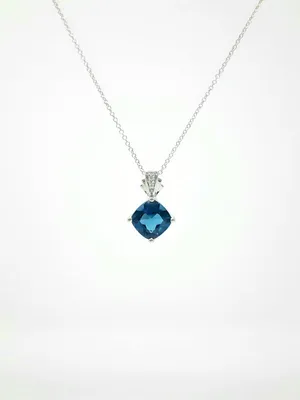 Blue Topaz and Diamond Pendant