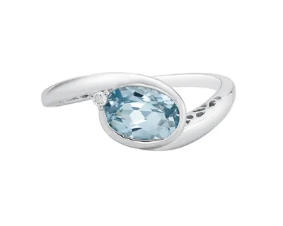 10K White Gold 7x5mm Blue Topaz and 0.02cttw Diamond Ring - Size 7