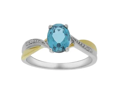 10K Two Tone, White & Yellow Gold Oval Cut Blue Topaz and 0.02cttw Diamond Ring - Size 7