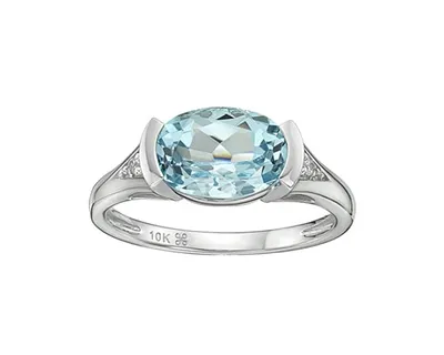 10K White Gold 10x7mm Oval Cut Sky Blue Topaz and 0.025cttw Diamond Ring - Size 7