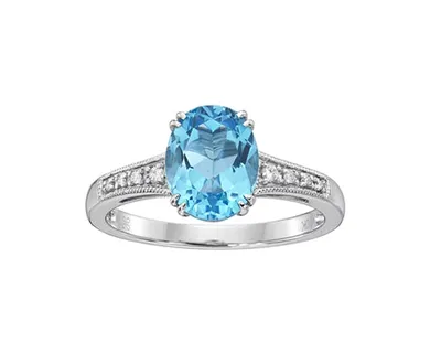 10K White Gold 9x7mm Oval Cut Swiss Blue Topaz and 0.05cttw Diamond Ring - Size 7