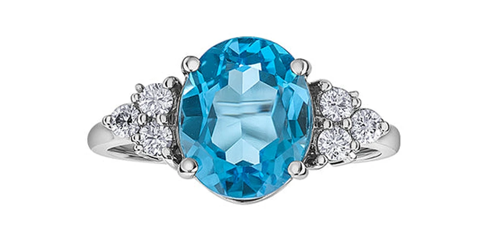 14K White Gold 10mm x 8mm Blue Topaz and 0.216cttw Canadian Diamond Ring