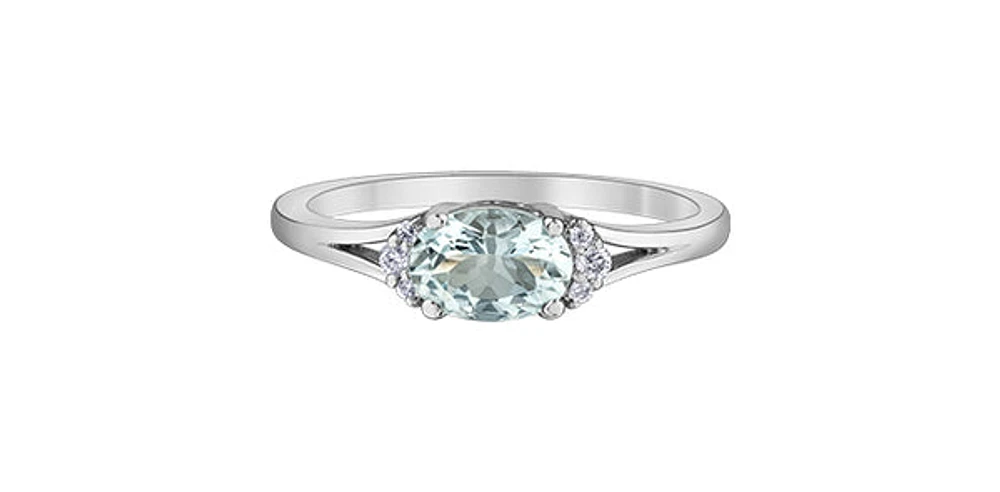 10K White Gold 5x7mm Oval Cut Aquamarine and 0.05cttw Diamond Ring, size 7