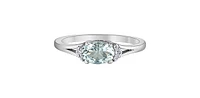 10K White Gold 5x7mm Oval Cut Aquamarine and 0.05cttw Diamond Ring, size 7