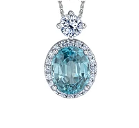 18K White Gold & Palladium Alloy(hypoallergenic) 12X10mm Genuine Oval Cut Blue Zircon and 1.04cttw Diamond Pendant