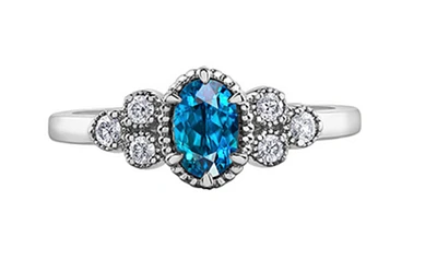 14K White Gold Genuine Blue Zircon and 0.14cttw Canadian Diamond Ring, 6.5