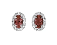 10K White Gold 5x3mm Oval Cut Garnet and 0.11cttw Diamond Halo Stud Earrings with Butterfly Backings
