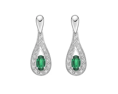 10K White Gold 5x3mm Oval Cut Emerald and 0.115cttw Diamond Dangle Earrings