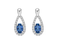 10K White Gold 6x4mm Oval Cut London Blue Topaz and 0.14cttw Diamond Earrings