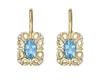 10K Yellow Gold 6x4mm Oval Cut Swiss Blue Topaz and 0.045cttw Diamond Dangle Earrings