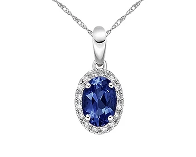 10K White Gold 6x4mm Oval Cut Sapphire and 0.06cttw Diamond Halo Pendant - 18 inches
