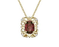 10K Yellow Gold 7x5mm Oval Cut Garnet and 0.03cttw Diamond Pendant - 18 inches