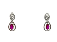 10K White Gold Oval Shape Ruby Stud Earrings