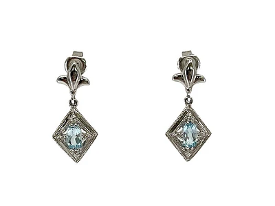 10K White Gold 0.60cttw Genuine Sky Blue Topaz & 0.03cttw Diamond Earrings