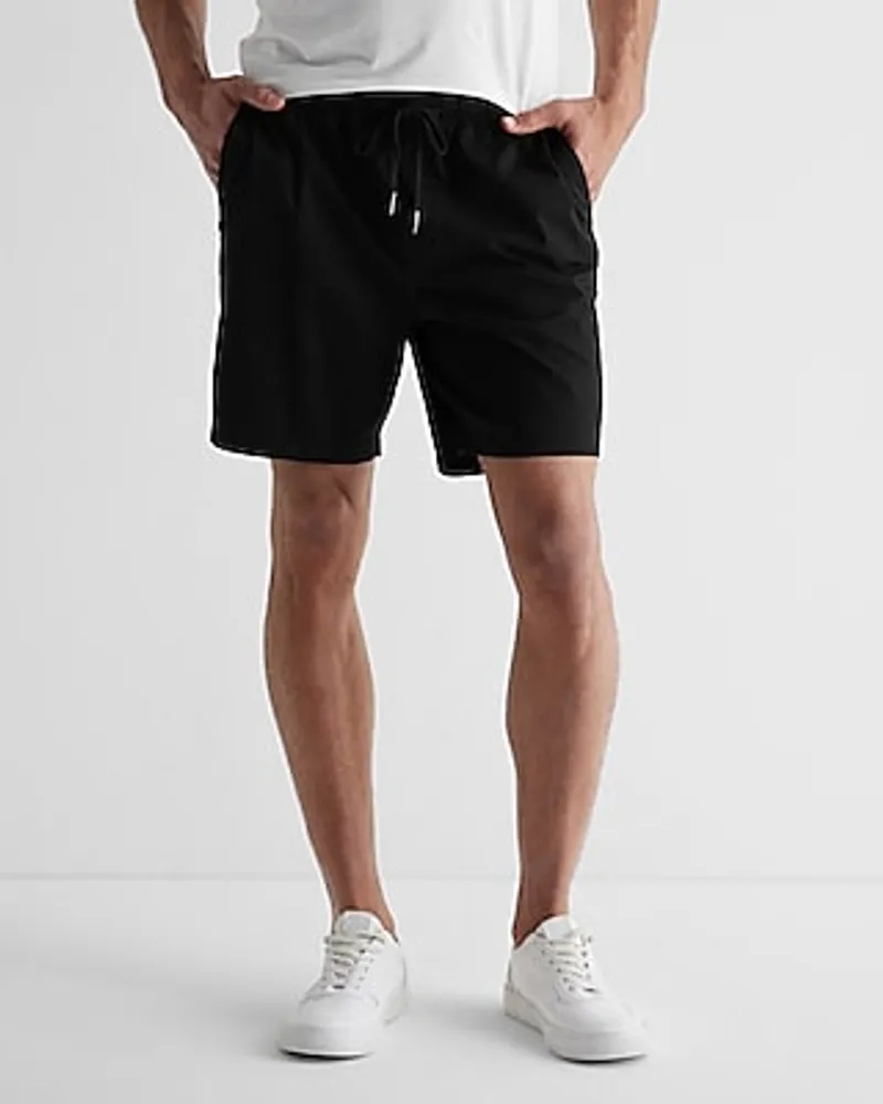 Solid 7" Hyper Stretch Elastic Waist Shorts Men's