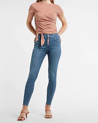Mid Rise Medium Wash Button Fly Skinny Jeans