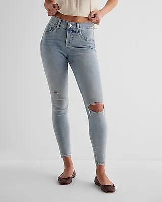 Mid Rise Light Wash Ripped Skinny Jeans