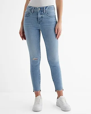 Mid Rise Light Wash Ripped Raw Hem Cropped Skinny Jeans