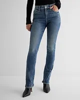 Mid Rise Medium Wash Twist Seam Skyscraper Jeans