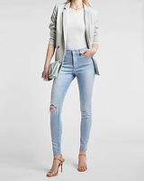 Mid Rise Light Wash Ripped Raw Hem Skinny Jeans