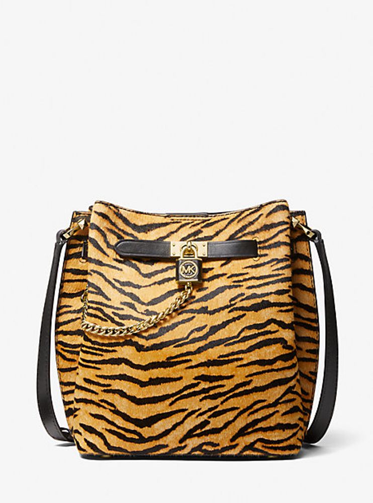 Michael Kors Hamilton Legacy Medium Tiger Print Calf Hair Messenger Bag |  Metropolis at Metrotown