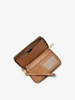 Grande pochette-bracelet en cuir et à logo