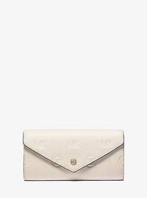 Grand portefeuille enveloppe Jet Set Travel en cuir gaufré à logo
