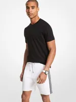 Short de jogging en mélange coton à bande logo