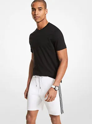 Short de jogging en mélange coton à bande logo