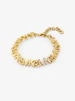 Bracelet en laiton à placage en or 14K à chaîne à logo à pavé