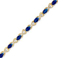 Oval Sapphire and Diamond Accent X Bracelet in 10K Gold - 7.25"|Peoples Jewellers