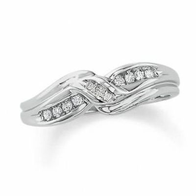 10K White Gold Crossover Ring with Round and Baguette Diamond Accents|Peoples Jewellers