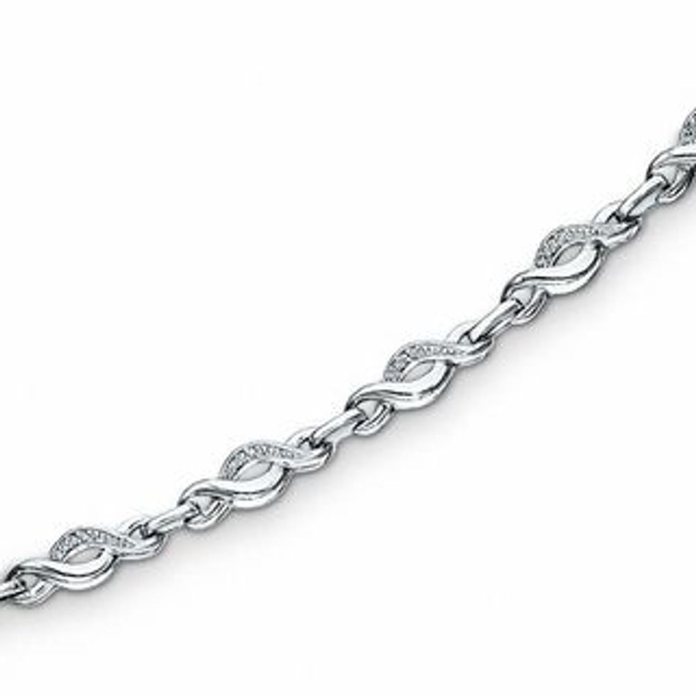 0.085 CT. T.W. Diamond Twist Bracelet in Sterling Silver - 7.25"|Peoples Jewellers