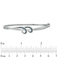0.33 CT. T.W. Enhanced Blue and White Diamond Twist Bangle in Sterling Silver|Peoples Jewellers
