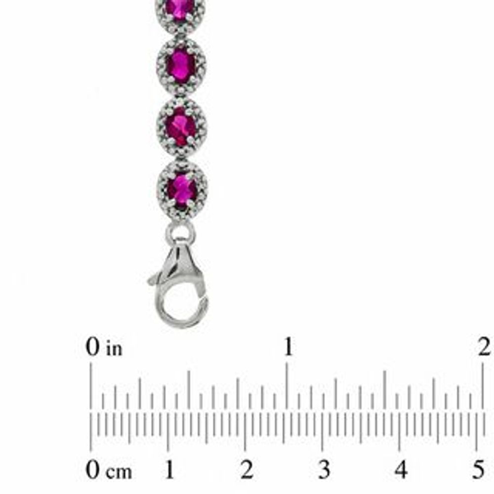 Oval Lab-Created Ruby and 0.075 CT. T.W. Diamond Bracelet in Sterling Silver - 7.5"|Peoples Jewellers