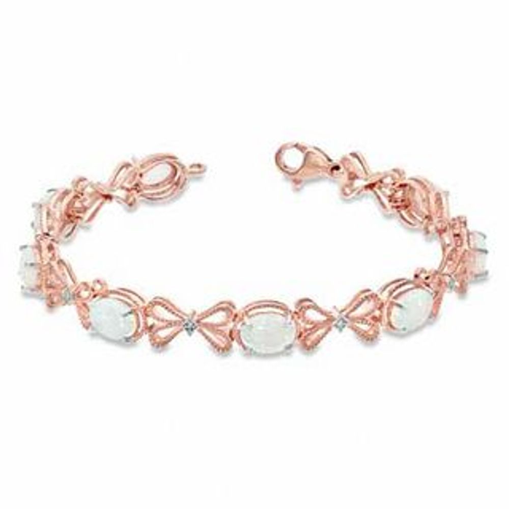 Oval Lab-Created Opal and Diamond Accent Milgrain Bow Bracelet in Sterling Silver with 14K Rose Gold Plate - 7.25"|Peoples Jewellers