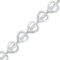 0.12 CT. T.W. Diamond Heart with Infinity Link Bracelet in Sterling Silver - 7.5"|Peoples Jewellers