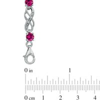 Lab-Created Ruby and Diamond Accent Infinity Bracelet in Sterling Silver - 7.5"|Peoples Jewellers