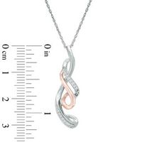 0.10 CT. T.W. Diamond Looping Ribbon Pendant in 10K Two-Tone Gold|Peoples Jewellers