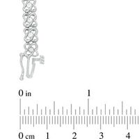 0.95 CT. T.W. Diamond Orbit Flower Link Bracelet in 10K White Gold - 7.25"|Peoples Jewellers